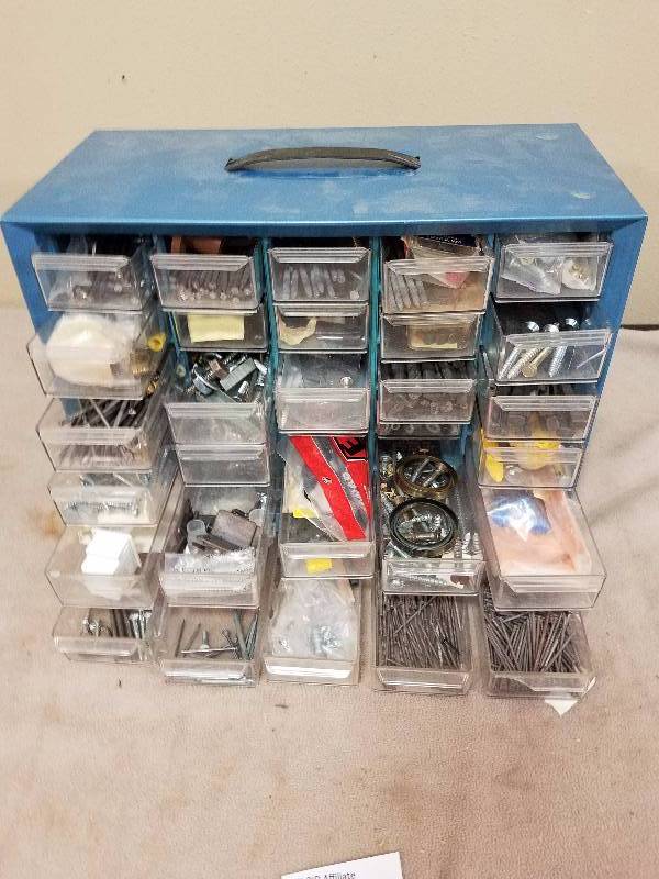 lot 93 image: Storage Bin Filled with Nails, bolts, washers etc.