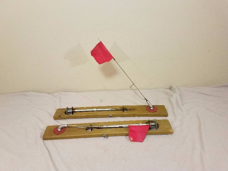 lot 125 image: 2 The Artic Fisherman Tip ups