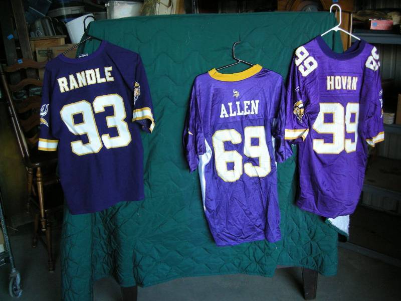lot 68 image: 3 Vikings Jerseys
