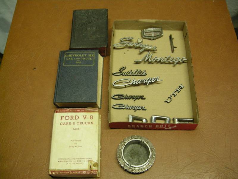 lot 79 image: Old Auto Repair Books - Name Badges