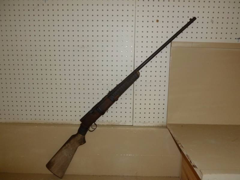lot 1 image: Vintage Springfield .22 Caliber Wall Hanger Gun