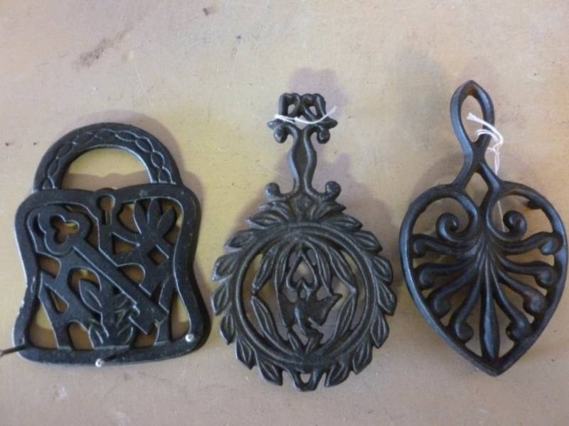 lot 279 image: Cast Iron Trivets