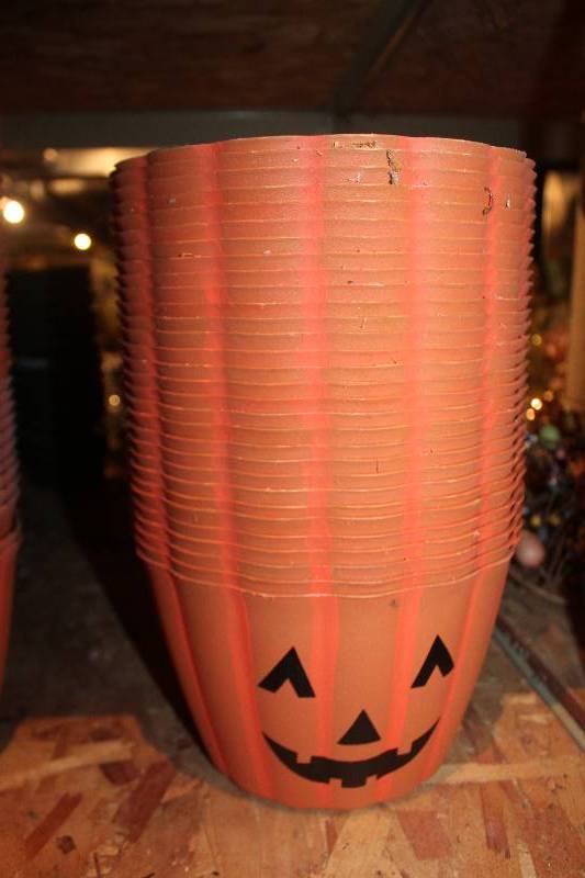 lot 933 image: Lot of (30) Plastic Pumpkin Planters
