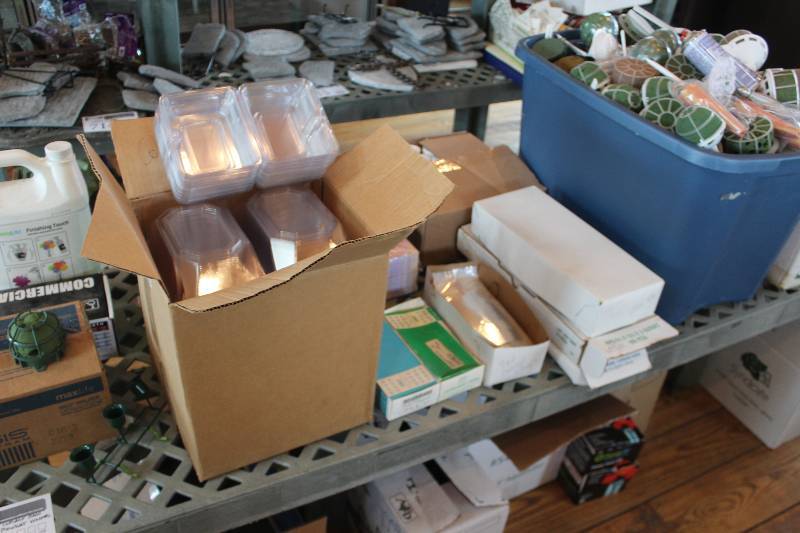 lot 716 image: Shelf Lot Includes Corsage Bags, Bouquet Holders, Cash Register Tape