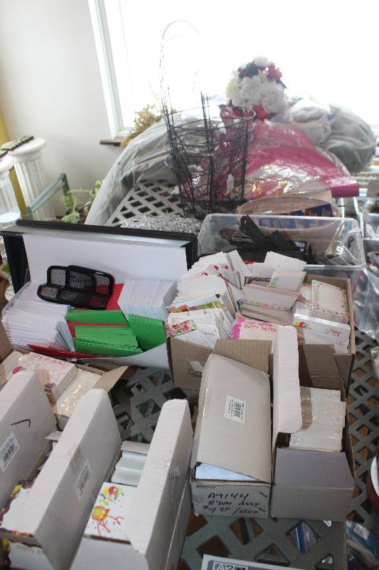 lot 719 image: Shelf Lot Includes Pillows, Wire Baskets, Envelopes, Cards