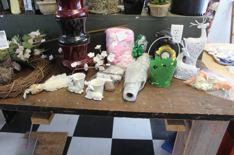 lot 737 image: Shelf Lot Includes Floral Containers, Baby Items, Clock