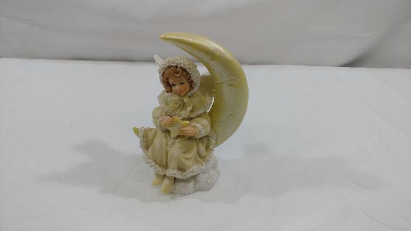lot 51 image: 6.5 Angel
