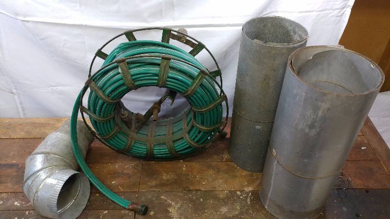lot 29 image: Hose With Hose Reel and Sheet Metal