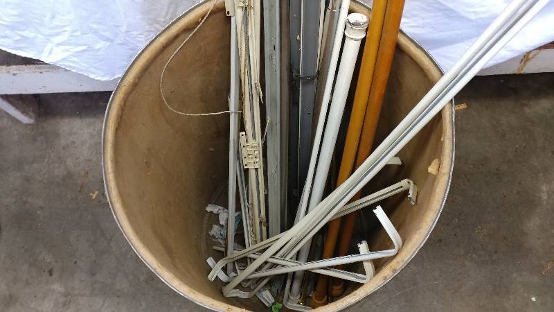lot 110 image: Variety of Curtain Rods and Barrel