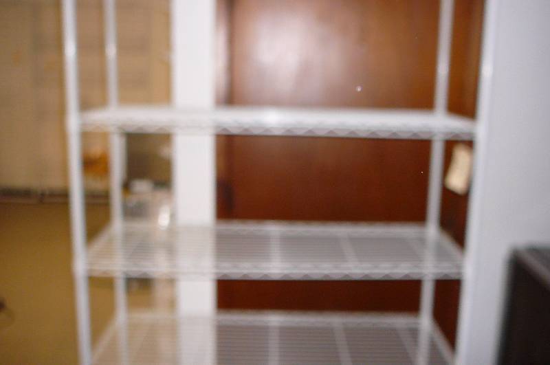 Rack with adjustable shelves 74 12 h X 18 w X 47 l