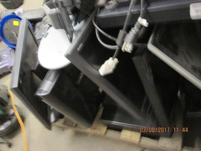 lot 28 image: pallet of moitors and monitor stand...