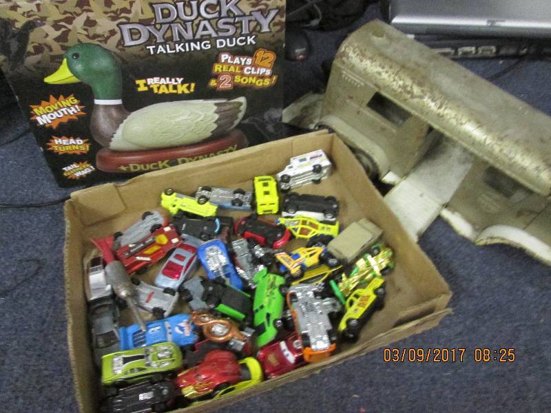 lot 46 image: duck dynasty talking duck, matchbox...