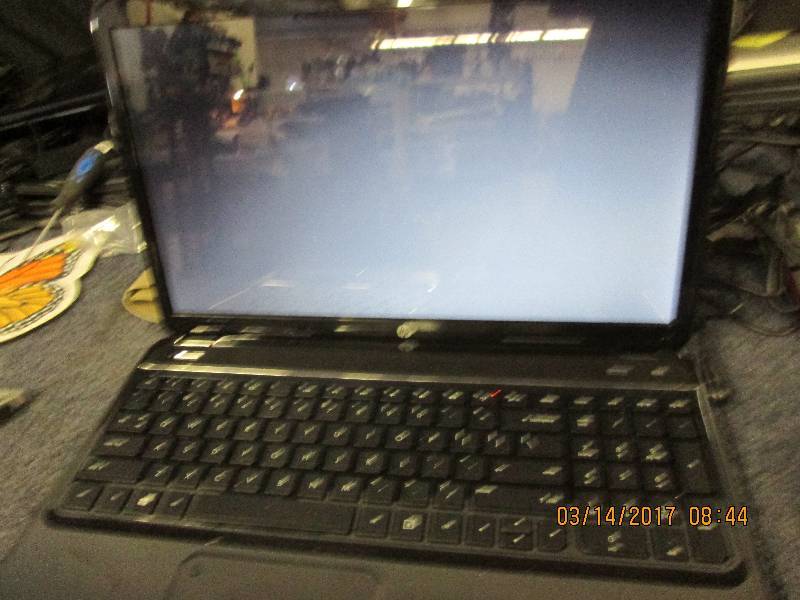 lot 83 image: HP vision laptop power on and goes ...
