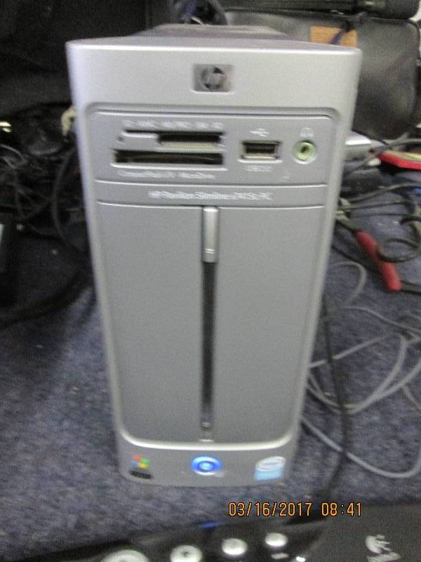 lot 105 image: hp pavilion simline boots to window...