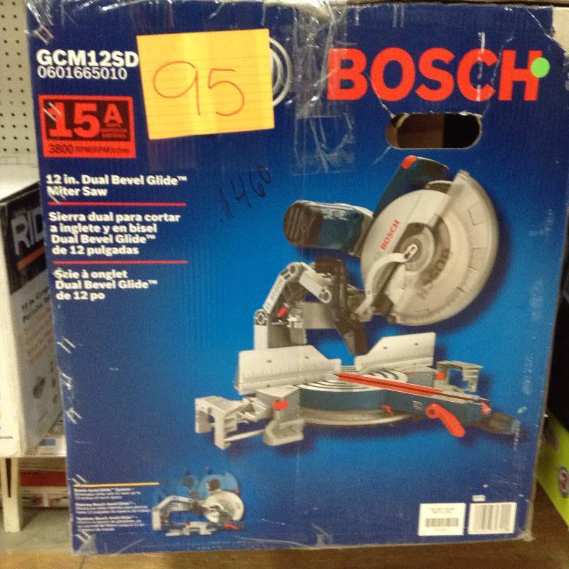 Bosch  15 Amp Corded Electric 12 in. Dual-Bevel Sliding Compound Miter Saw with 60-Tooth Carbide Saw Blade New Retails for $549
