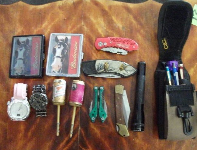 lot 40 image: Knives, Watches, Flashlights, Cigarette Case
