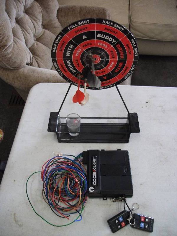 lot 41 image: Remote Car Start & Magnetic Darts Shot Drinking Game