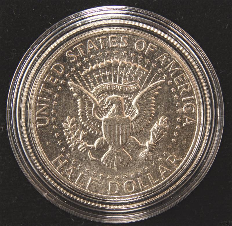 1964 KENNEDY SILVER HALF DOLLAR UNC IN AIRTITE HOLDER