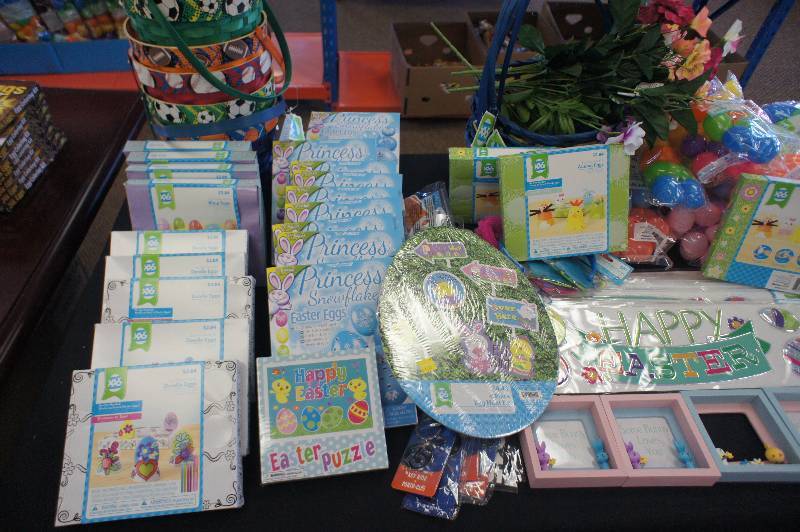 lot 148 image: Large Lot of Easter Decorations- Lot consists of Easter Bags, Puzzles, Keychains, Wall-Decorations, Wall-Art, Ribbon, Easter Buckets, Cupcake kits, Flowers, Coloring Kits