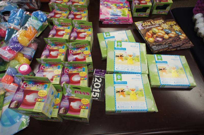 lot 149 image: Large Lot of Easter Decorations- Lot consists of Easter Bags, Easter Eggs, Easter Buckets, Easter Baskets, Wall-Art, Coloring Kits, Easter Grass, and Ribbon