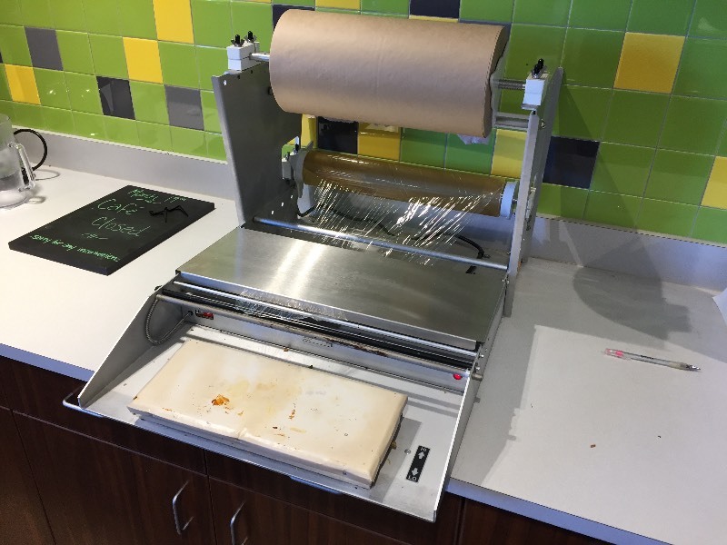 Heat seal wrapping station