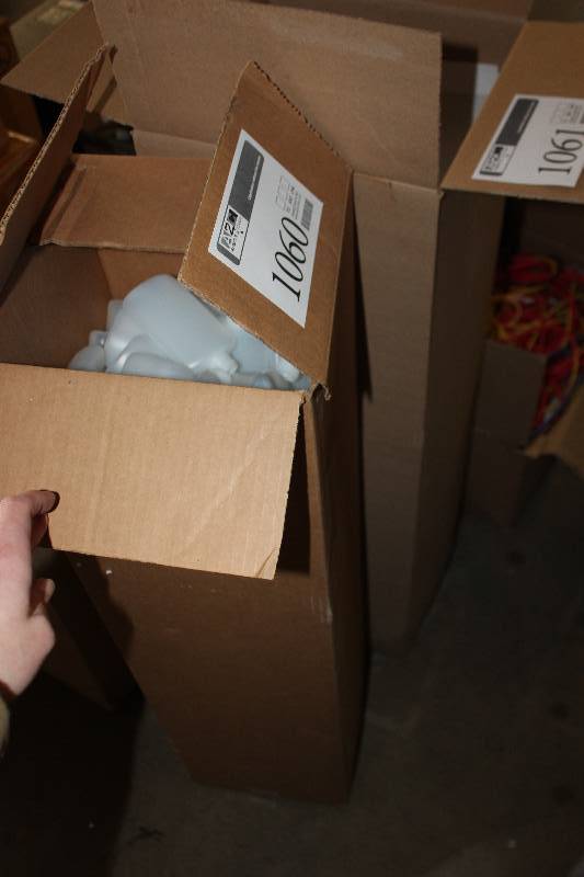 Boxes of Small Plastic Lotion Bottles