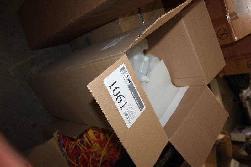 Boxes of Small Plastic Lotion Bottles