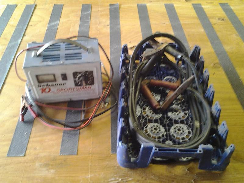 lot 18 image: Schauer 10 Amp Battery Charger & Jumper Cables