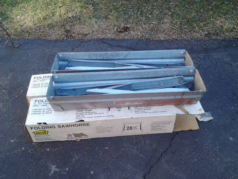 lot 49 image: Pair Folding Saw Horses-1500 LB Capacity