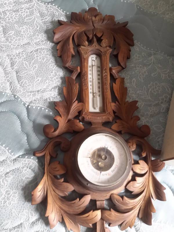 lot 31 image: Cuckoo Clock and ThermometerBarometer