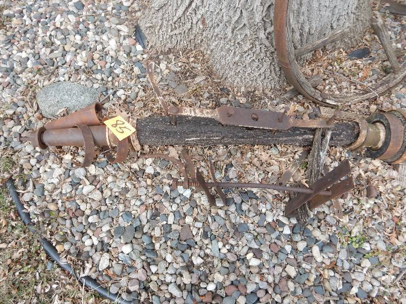 lot 85 image: Antique Wagon Wheel Parts as pictured