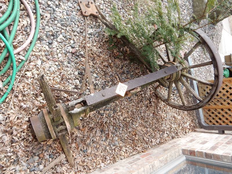 lot 86 image: Antique Wagon Wheel Parts as pictured