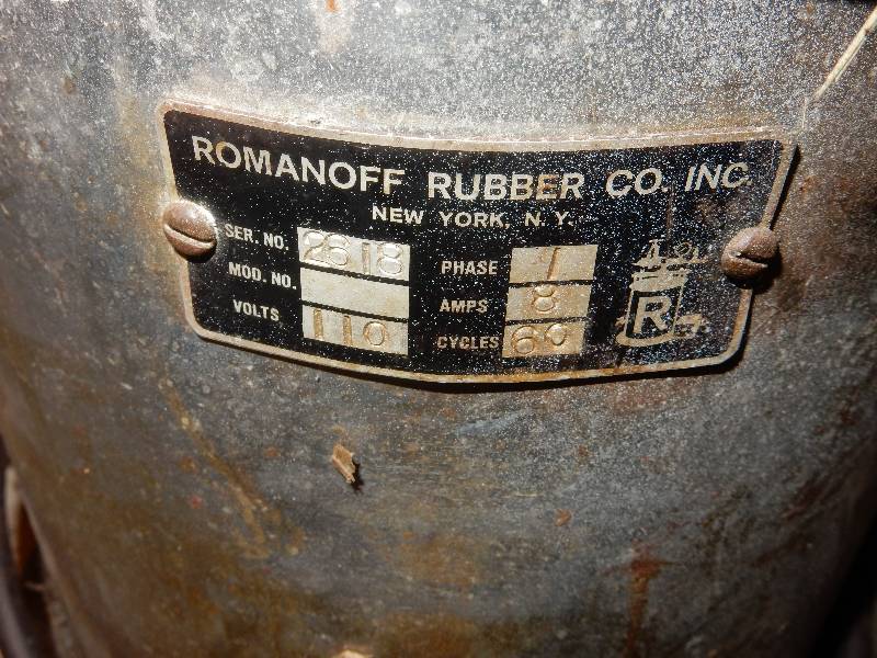lot 105 image: Romanoff Rubber Co.. Looks like a pressure pot for paint sprayer