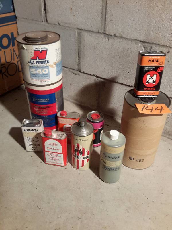 lot 143 image: New Container of Smokeless powder and other items for making shells.