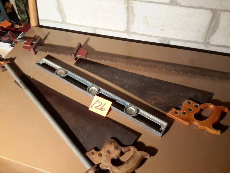 lot 126 image: Hand saws, level and 2 long clamps