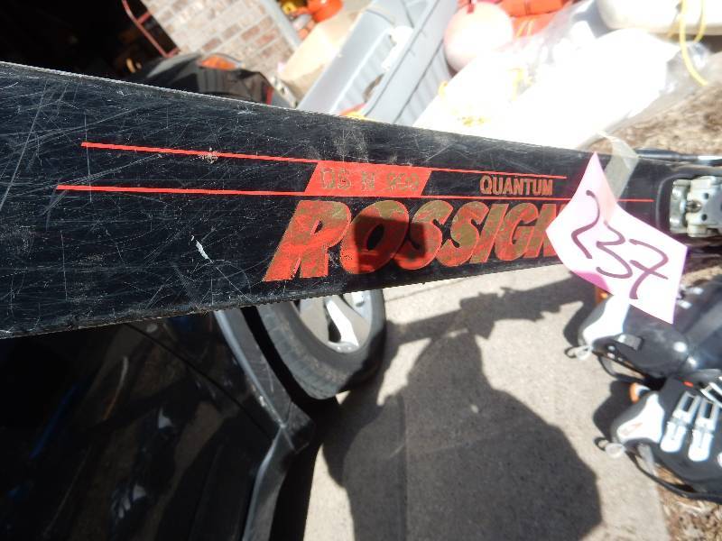 lot 237 image: Pair of Quantum Rossignol Skiis and pair of Ski boots..