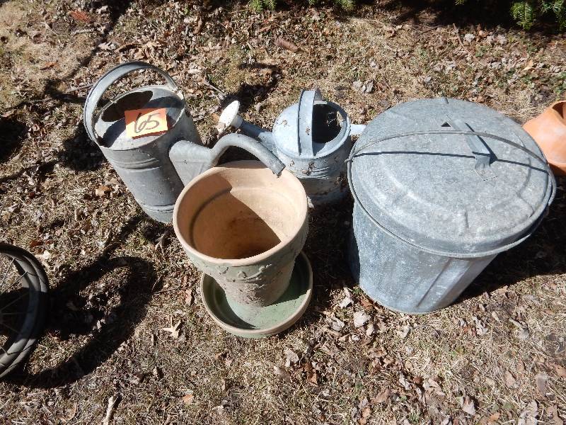 lot 65 image: Galvanized Watering  pitchers, Garbage can.. Planter
