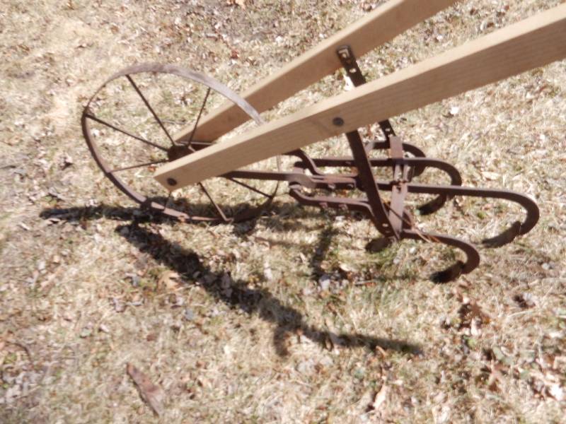 lot 251 image: Vintage Hand Cultivator.. Looks like they put new handles on it