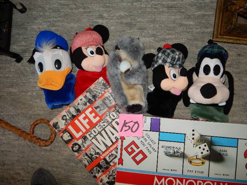 lot 15O image: Disney Puppets, Monopoly Game, LIFE War Book
