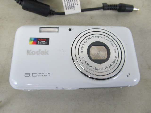 lot 83 image: 3 Nice Digital Cameras - 2 wAdapters