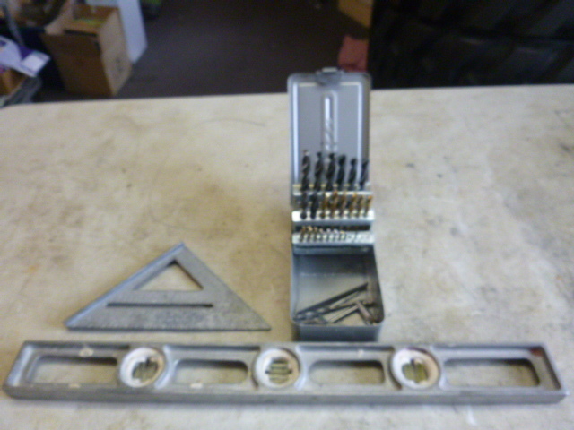 lot 26 image: Drill Bits, Level and Speed Square