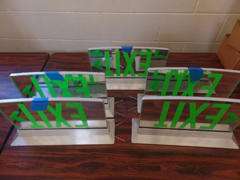 LIGHTED EXIT SIGNS
