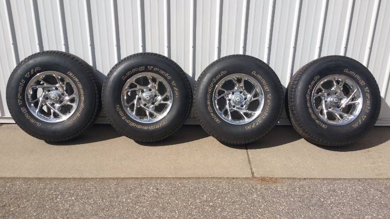lot 5 image: 12 Ton BF Goodrich Long Trail TA Tires on American Racing 6 Bolt Rims  Spare Tire