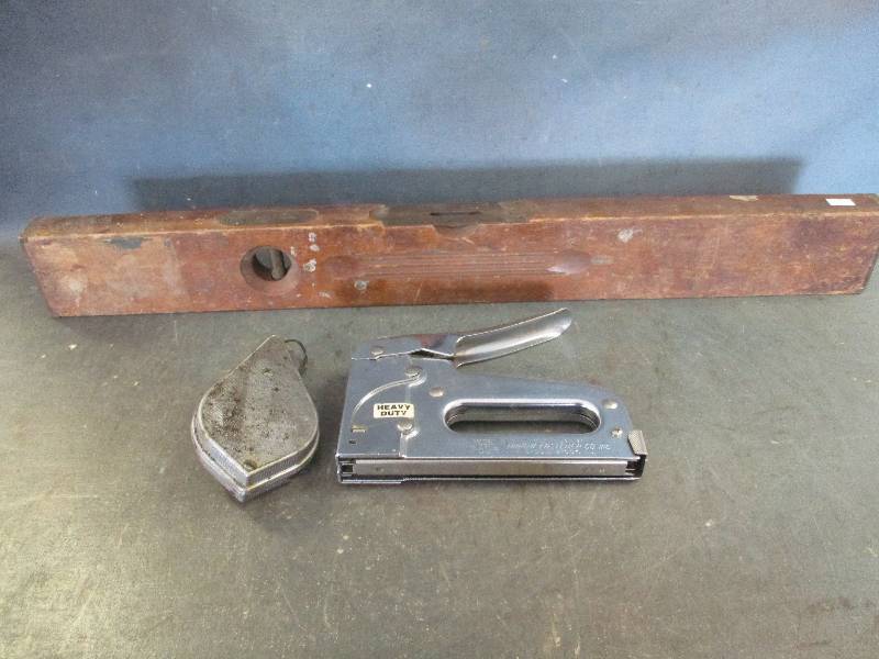 lot 66 image: Chalk Line Reel, Staple Gun and Vintage Level