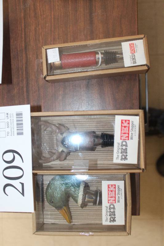 lot 209 image: Lot of (3) Carson The Original Rednek Wine Stoppers