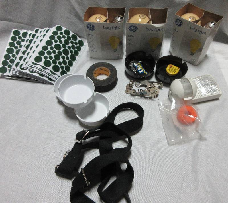 lot 45 image: MISC LOT Felt Pads, Ash Trays, Bug Lights, Sewing Machine Part,  Misc