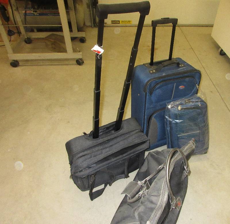 lot 124 image: 4 BAGS , 3 WITH ROLLERS, 1 COMPUTER CASE, 1 CARRY-ON