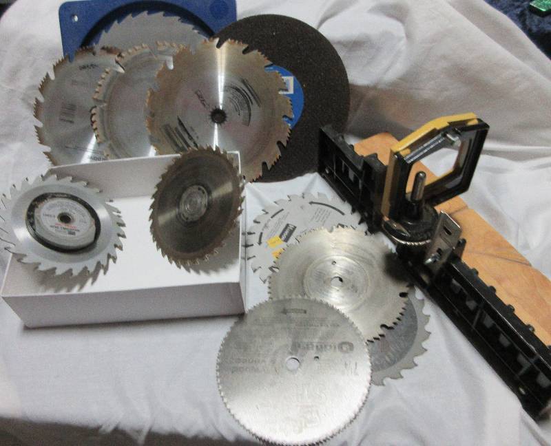 lot 94 image: MITER BOX, 10 BLADES, 1 SANDING DISC
