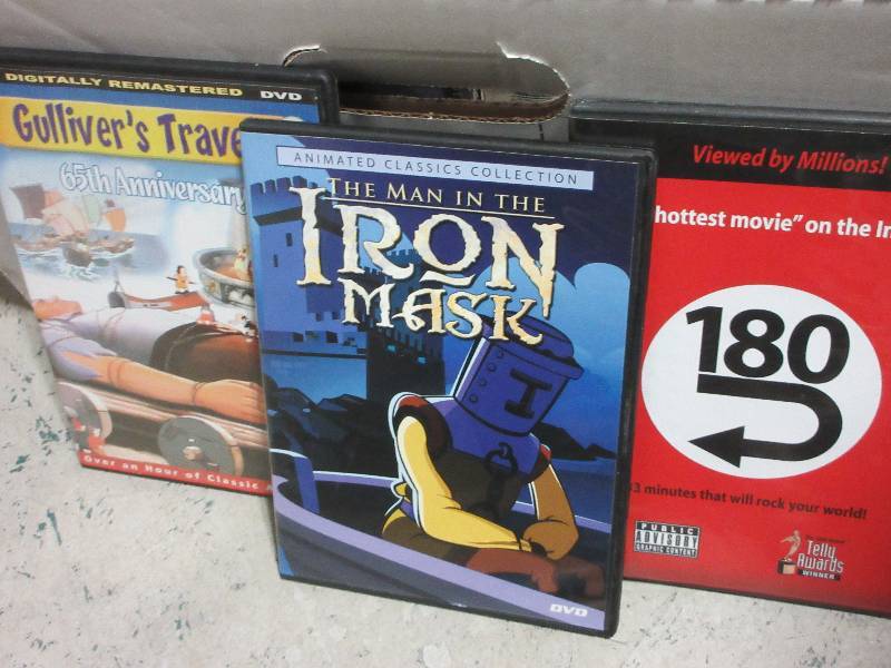 lot 218 image: Box of VHS, DVDS & AUDIO CASSETTES,