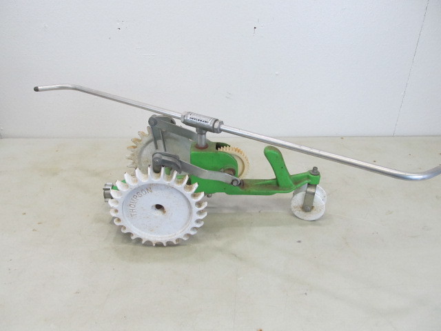 lot 15 image: Vintage Thompson Tractor Sprinkler
